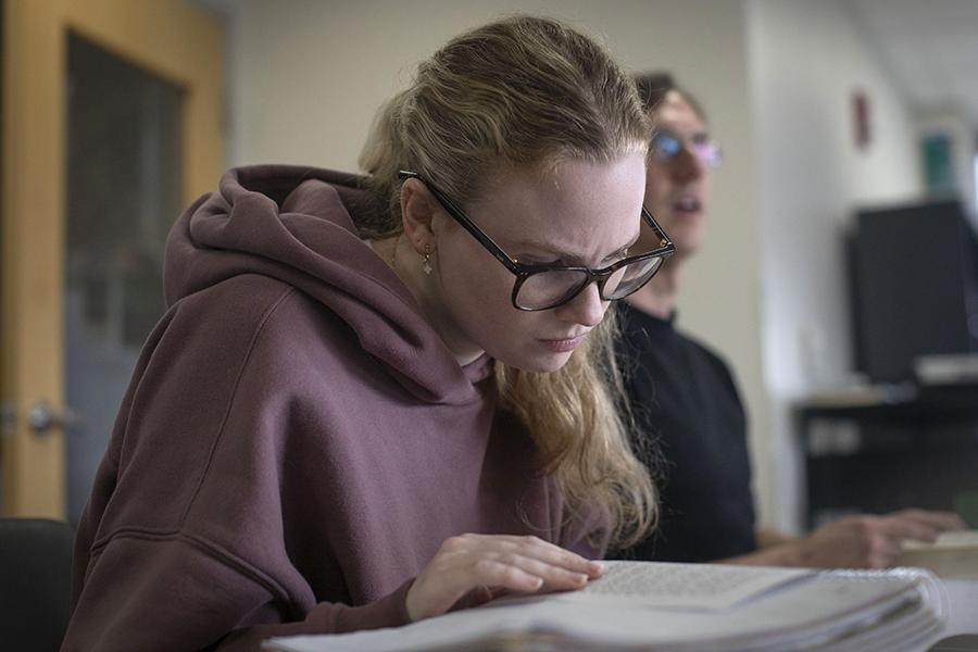 A student reads a book.